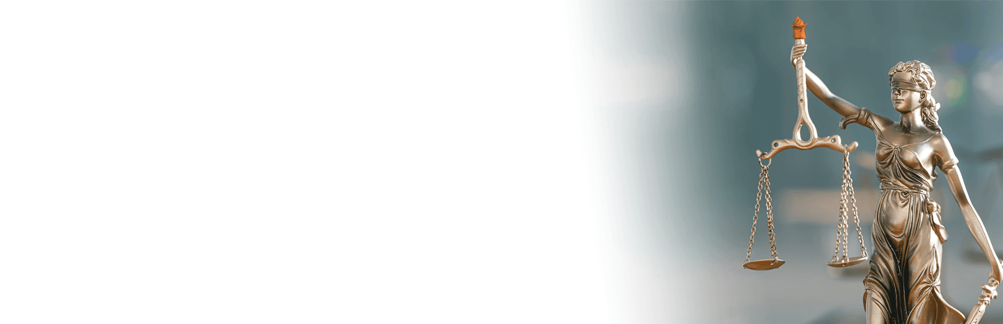 Scales of justice statuette