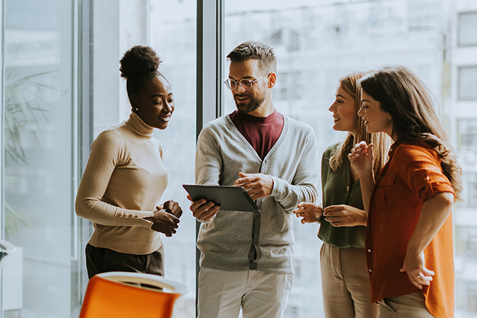 Young multiethnic startup team working at the modern office